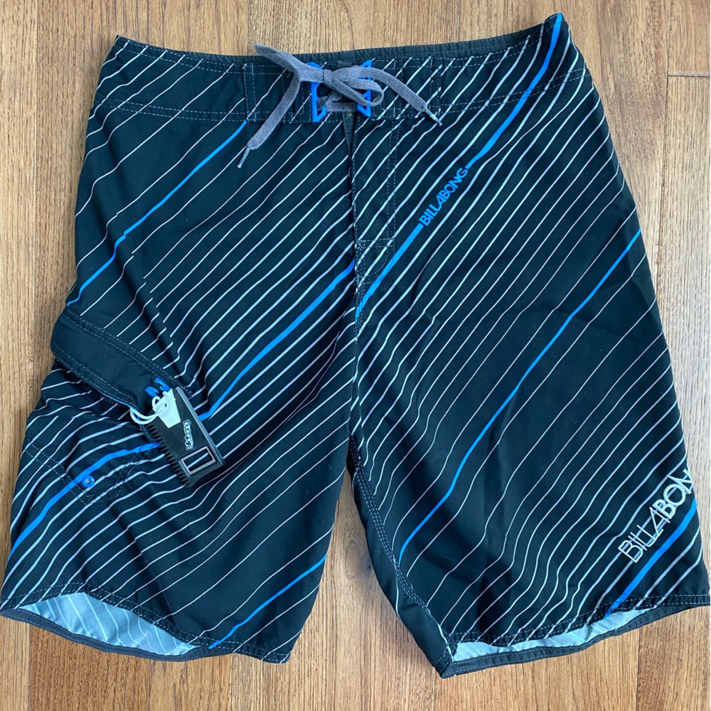Men’s Billabong swim trunks. Attached bottle opener in side pocket